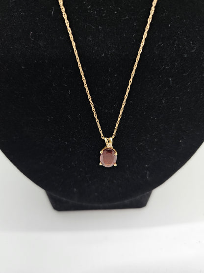 Gold Garnet Earring and Necklace.